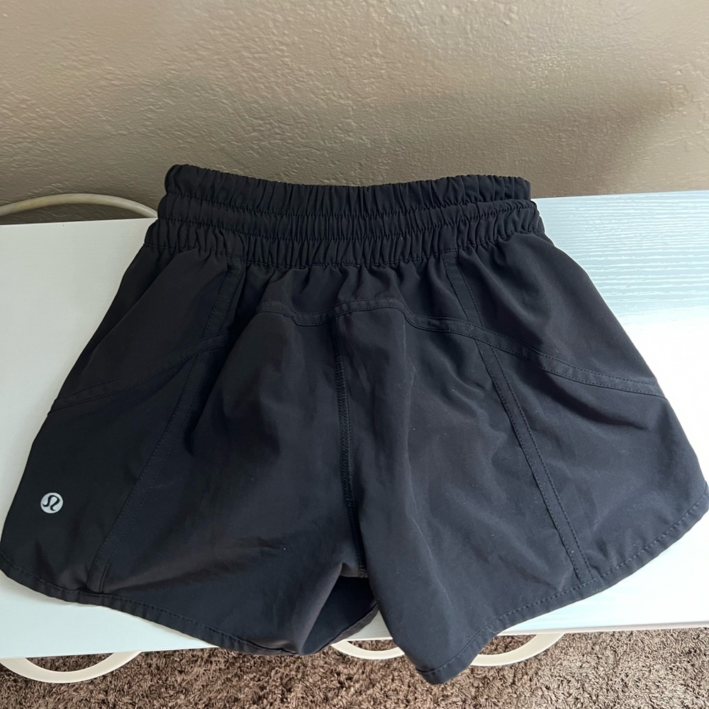 Black lulu lemon running shorts size 4